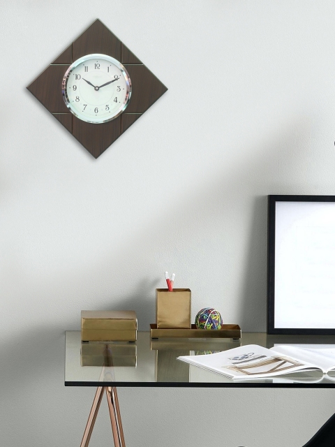 

eCraftIndia Brown Handcrafted Geometric Solid Analogue Wall Clock (33.08 x 33.08 x 6.35)