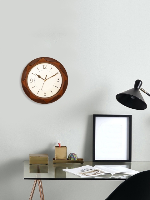 

eCraftIndia Brown Round Solid Analogue Wall Clock (30.48 x 30.48 x 12.7)