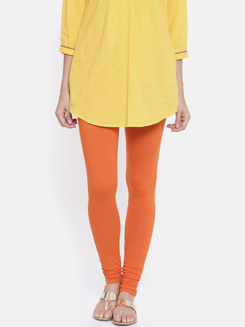 

Bitz Women Orange Solid Churidar-Length Organic Cotton Leggings