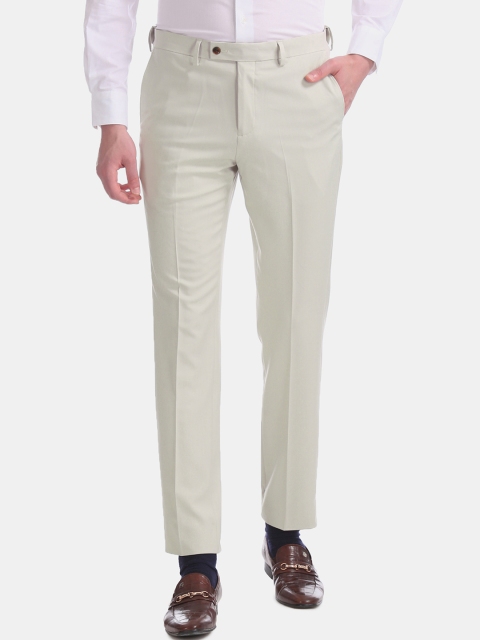 

Arrow Men Beige Tapered Fit Solid Formal Trousers