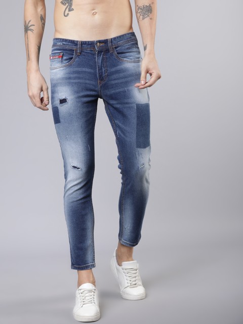 

Ecko Unltd Men Blue Tapered Fit Mid-Rise Low Distress Stretchable Crop Jeans