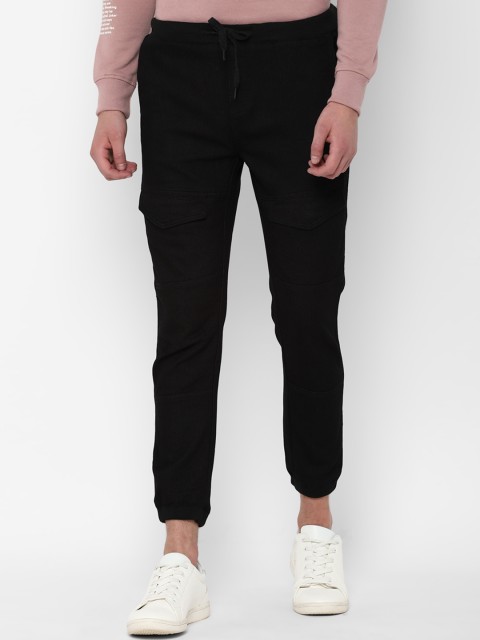 

People Men Black Regular Fit Solid Crop Denim Joggers