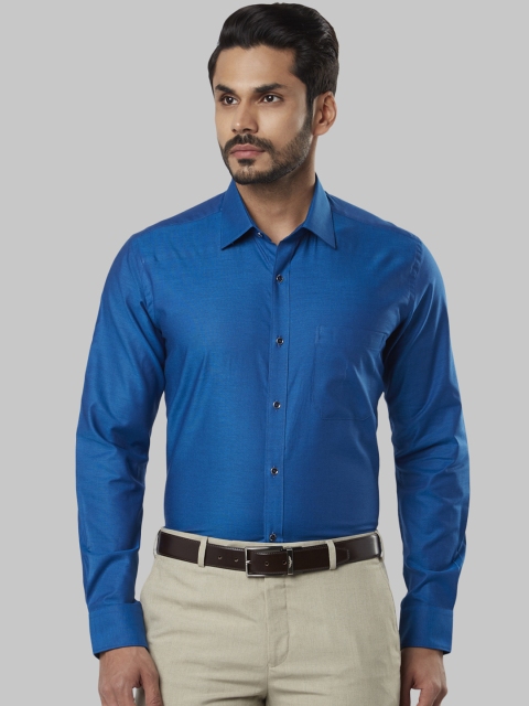 

Raymond Men Blue Regular Fit Solid Party Shirt