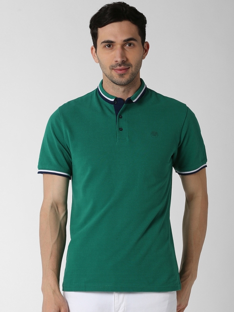 

Peter England Casuals Men Green Solid Polo Collar T-shirt