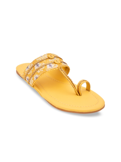 

Jivaana Women Yellow Printed Synthetic Patent One Toe Flats