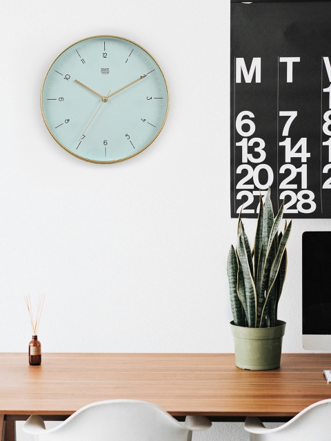 

Chumbak Blue Round Solid Analogue Wall Clock