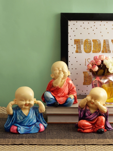 

TIED RIBBONS Set of 3 Red & Blue Buddha Monk Statue Figurines Showpiece