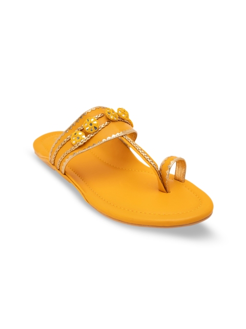 

Jivaana Women Yellow Embellished Synthetic Patent One Toe Flats