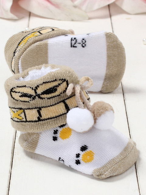 

Walktrendy Infants Beige & White Printed Booties