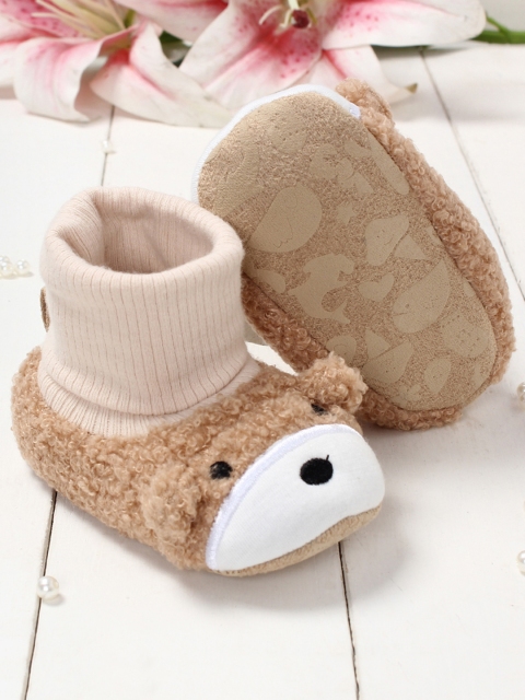 

Walktrendy Infants Beige Solid Booties with Animal Detail