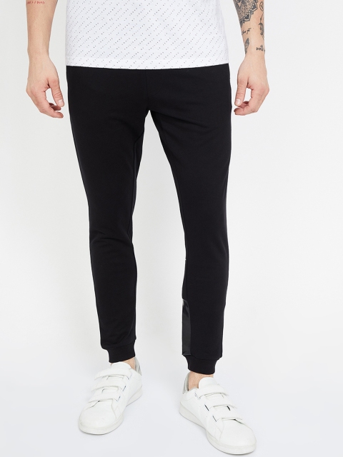 

Smiley World Men Black Solid Joggers