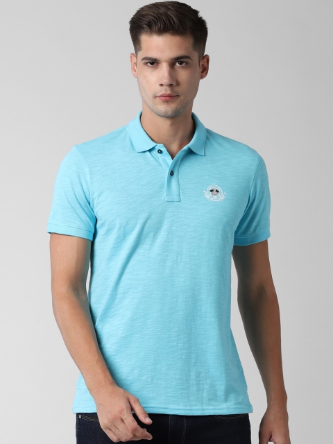 

Peter England Casuals Men Blue Solid Polo Collar T-shirt