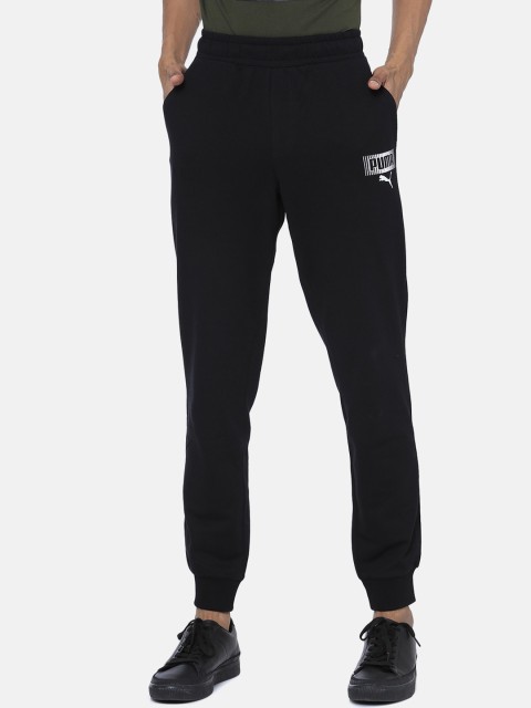 

Puma Men Black Solid Knitted Graphic Print III Joggers