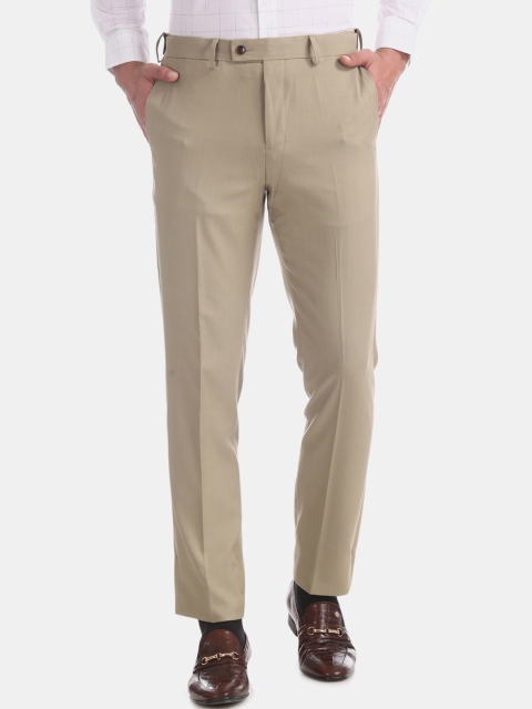 

Arrow Men Beige Tapered Fit Solid Formal Trousers