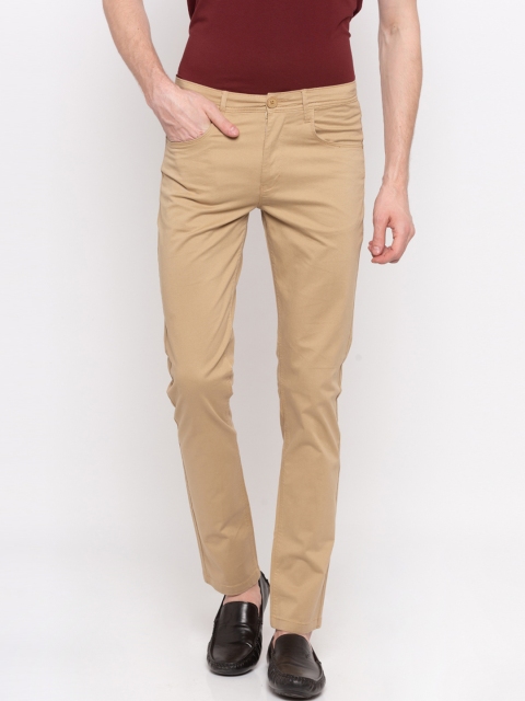 

SPYKAR Men Beige Slim Fit Solid Regular Trousers