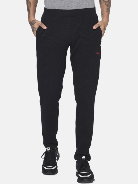 

Puma Men Black Solid Stylized Track Pants