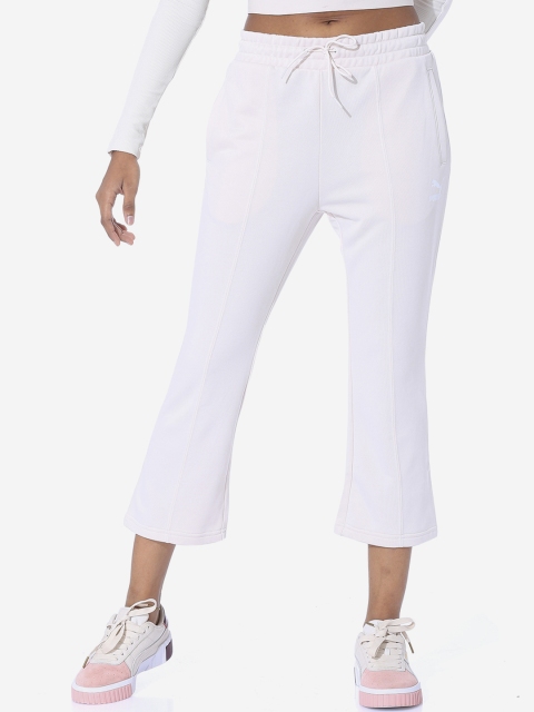 

Puma Women White Solid Classics Kick Flare Pant Pastel Parchmen Track Pants