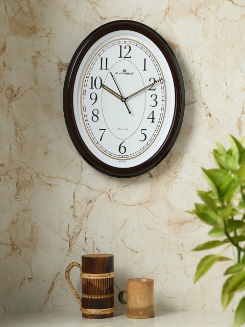 

ZANIBO Brown & White Oval Solid 32 cm Analogue Wall Clock