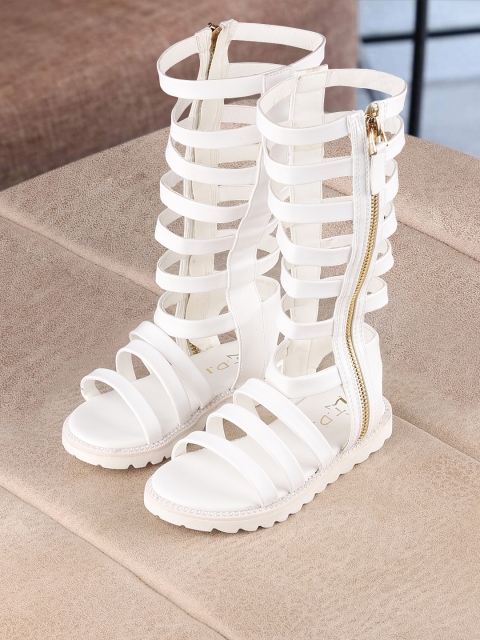 

Walktrendy Girls White Solid High-Top Gladiators