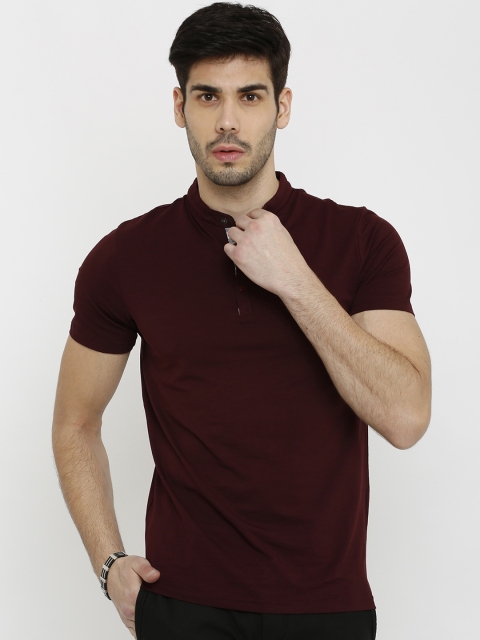 

Rex Straut Jeans Men Maroon Solid Polo Collar T-shirt