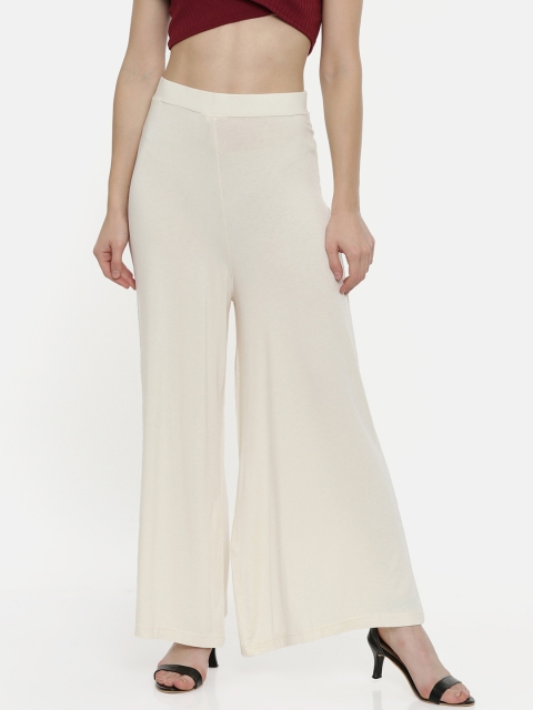 

Bitz Women Off-White Solid Flared Palazzos