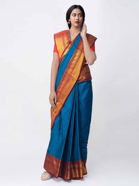 

Unnati Silks Blue Pure Cotton Solid Narayan Peth Saree