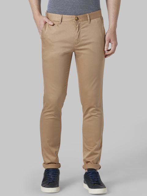 

Park Avenue Men Khaki Regular Fit Solid Regular Trousers