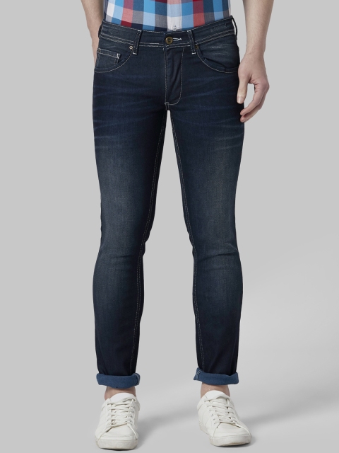 

Park Avenue Men Blue Tapered Fit Mid-Rise Clean Look Jeans