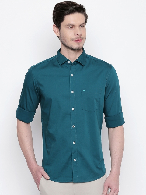 

Basics Men Teal Blue Solid Slim Fit Casual Shirt