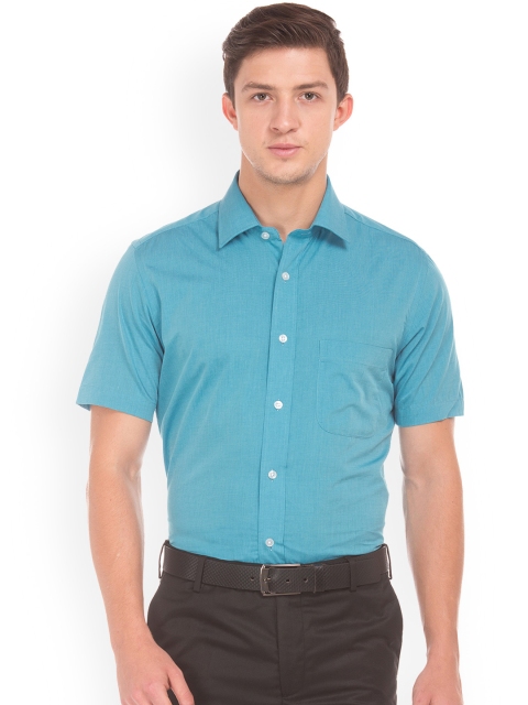 

Arrow Men Blue Regular Fit Solid Semiformal Shirt