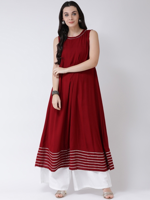 

Castle Women Maroon Solid Anarkali Kurta