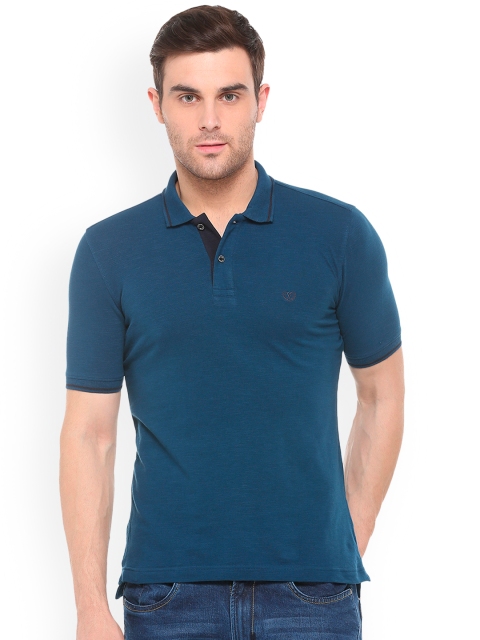 

Van Heusen Sport Men Teal Solid Polo Collar T-shirt