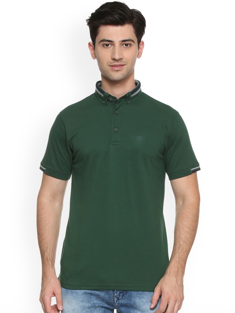 

Peter England Casuals Men Green Solid Polo Collar T-shirt