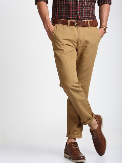 

Peter England Casuals Men Brown Slim Fit Solid Regular Trousers