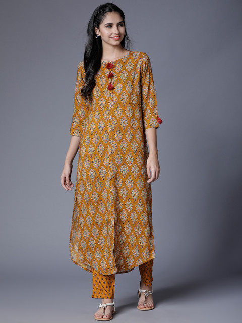 

Vishudh Women Yellow Printed Kurta with Trousers