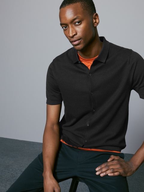 

Marks & Spencer Men Black Solid Polo Collar T-shirt