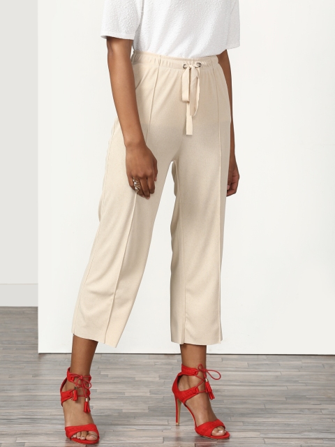 

Miss Bennett Women Beige Regular Fit Solid Regular Trousers