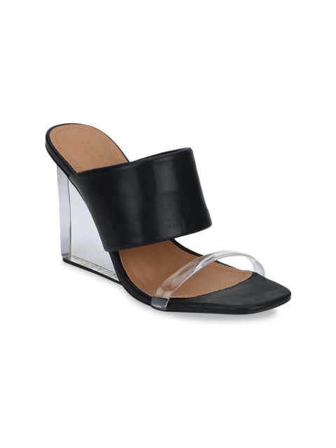 

Truffle Collection Women Black Solid Heels