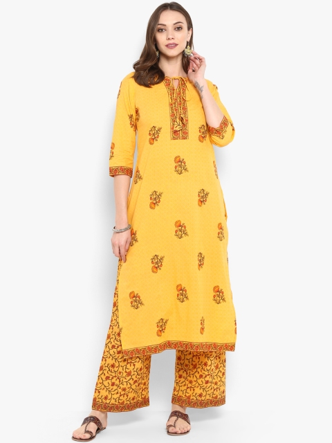 

Meeranshi Women Yellow Printed Kurta with Palazzos
