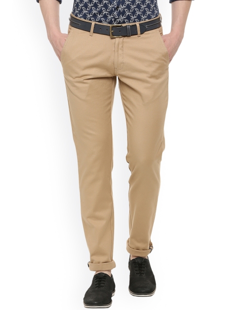 

Van Heusen Sport Men Beige Slim Fit Self Design Regular Trousers