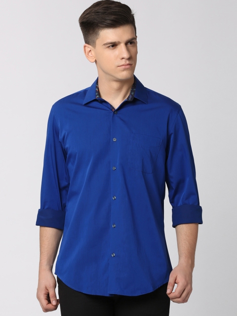 

Peter England Men Blue Slim Fit Solid Casual Shirt