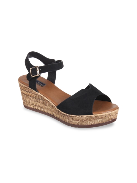 

Flat n Heels Women Black Solid Heels