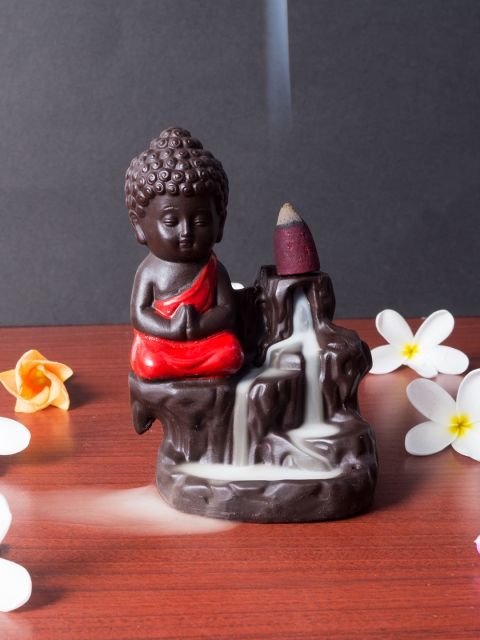 

Golden Peacock Red & Black Buddha Smoke Fountain Showpiece