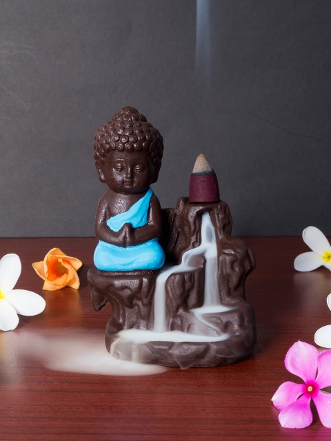 

Golden Peacock Blue & Black Buddha Smoke Fountain Showpiece