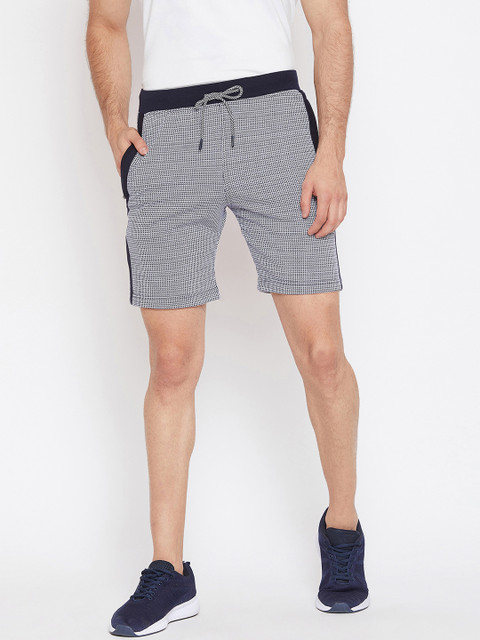 

Okane Men Navy Blue Self Design Regular Fit Regular Shorts