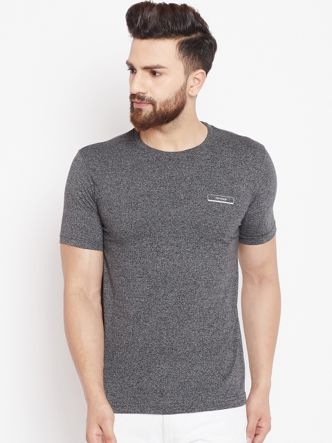

Okane Men Black Self Design Round Neck T-shirt