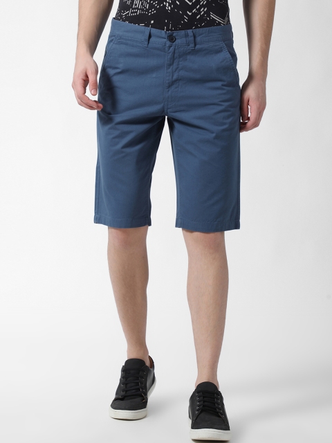 

Peter England Casuals Men Blue Solid Slim Fit Regular Shorts