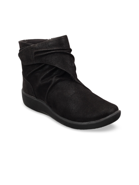 

Clarks Women Black Solid Mid-Top Flat Boots