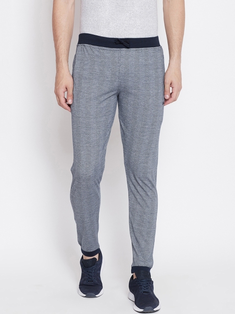 

Okane Men Blue Self Design Slim-Fit Trackpants