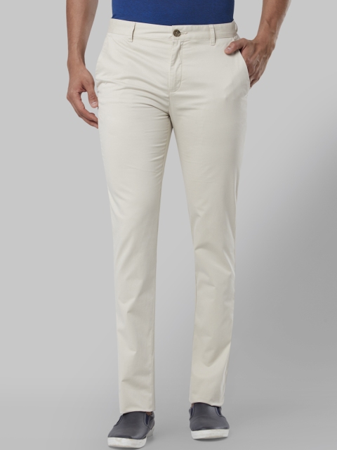 

Raymond Men Beige Slim Fit Solid Regular Trousers